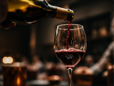 Wine being poured into a glass
